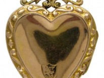 Heart-Shaped Gold Locket with Garnet & Pearl Decorative Features