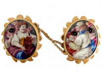 Pair of Enamel & Gold Masked Miniature Brooches