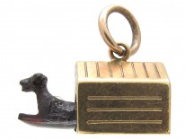 Gold Dog in Kennel Charm