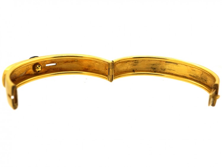Victorian 18ct Gold Buckle Design Bangle Set With a Cabochon Garnet