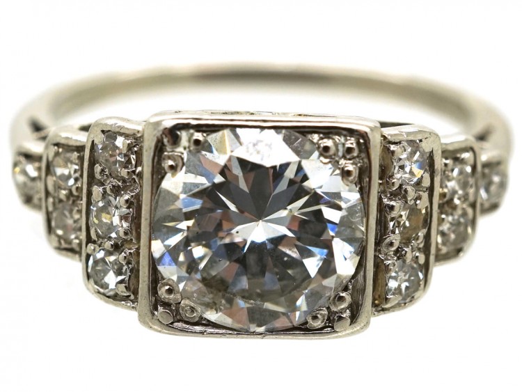 Palladium Single Stone Diamond Ring With Stepped Diamond Shoulders