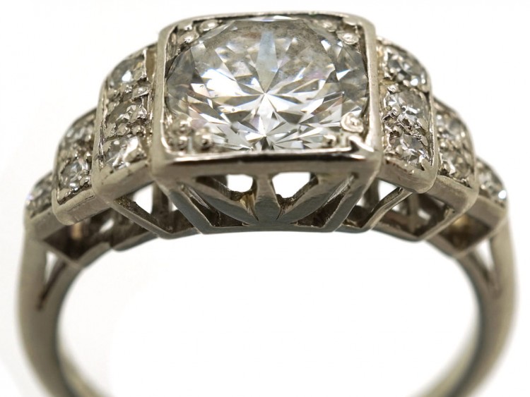 Palladium Single Stone Diamond Ring With Stepped Diamond Shoulders