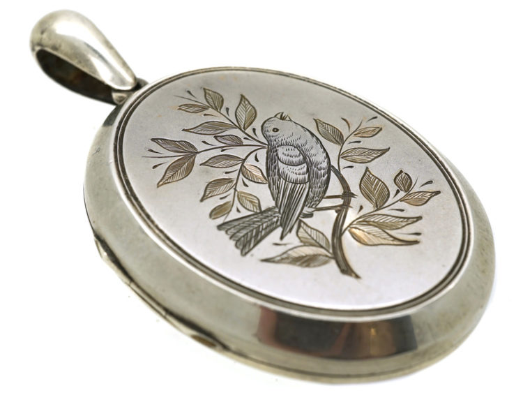 Victorian Silver Oval Shaped Locket With Bird in Bough Motif
