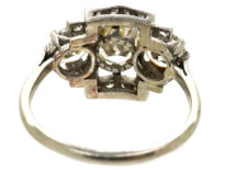 Art Deco Platinum & Three Stone Diamond Ring Within a Geometric Setting