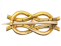 Edwardian 15ct Gold Lover's Knot Brooch Set With a Diamond