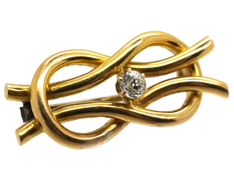 Edwardian 15ct Gold Lover's Knot Brooch Set With a Diamond