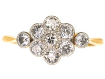 Edwardian Diamond Cluster Ring With a Diamond on Either Side