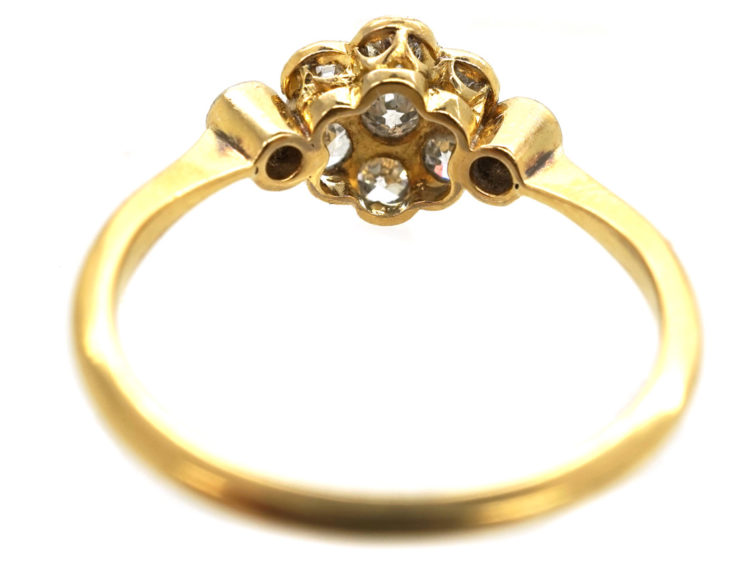 Edwardian Diamond Cluster Ring With a Diamond on Either Side