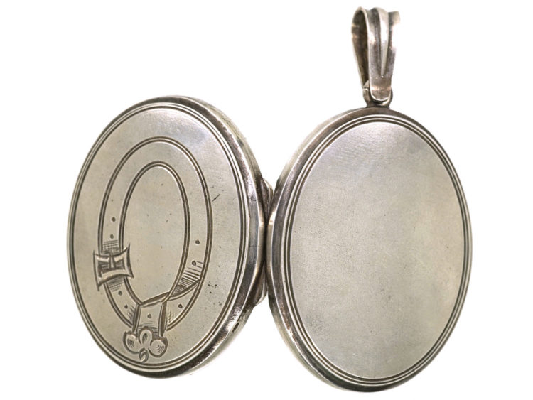 Victorian Oval Silver Locket with Garter Motif