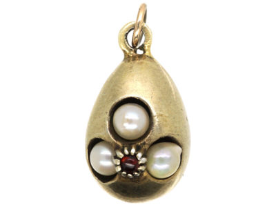 Edwardian Silver Gilt Egg Pendant set with Pearls & a Garnet