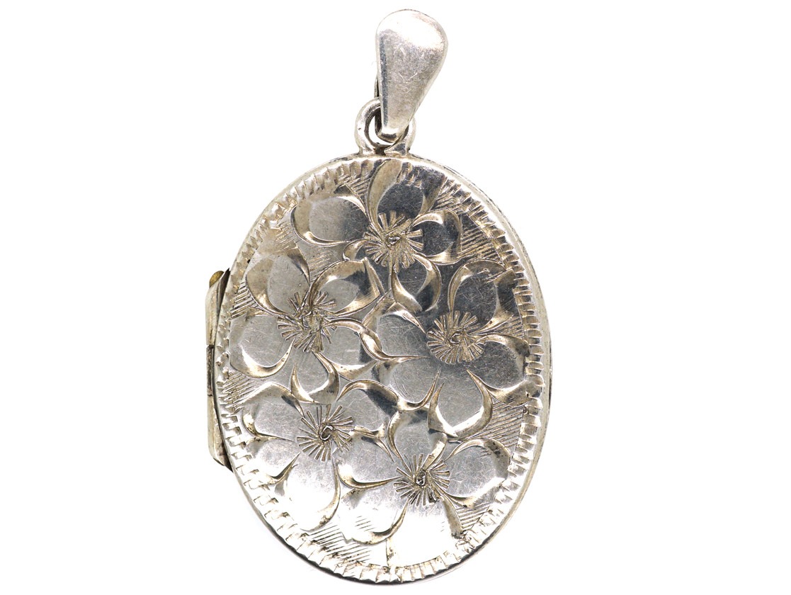 silver locket with engraving