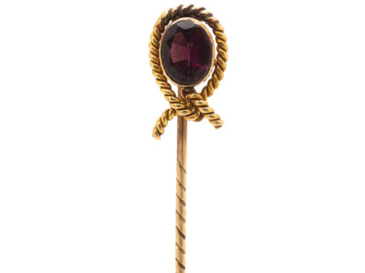 Edwardian 15ct Gold Tie Pin set with a Garnet within a Knot