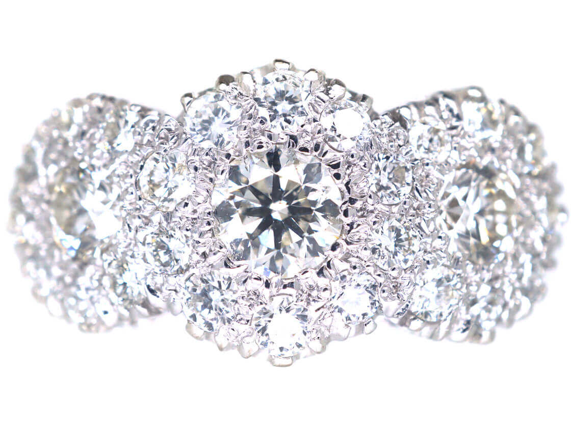 Triple cluster clearance diamond ring