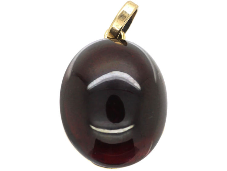 Victorian 15ct Gold Pendant set with a Cabochon Garnet with a Locket on Reverse