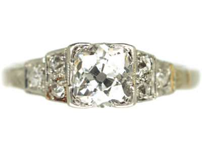 Art Deco Platinum & Diamond Solitaire Ring with Step Cut Diamond Shoulders