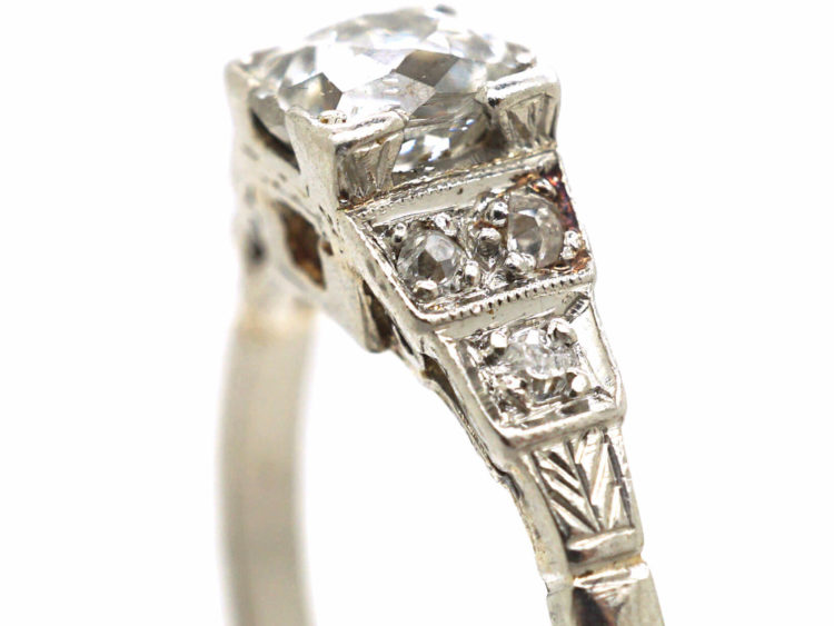 Art Deco Platinum & Diamond Solitaire Ring with Step Cut Diamond Shoulders