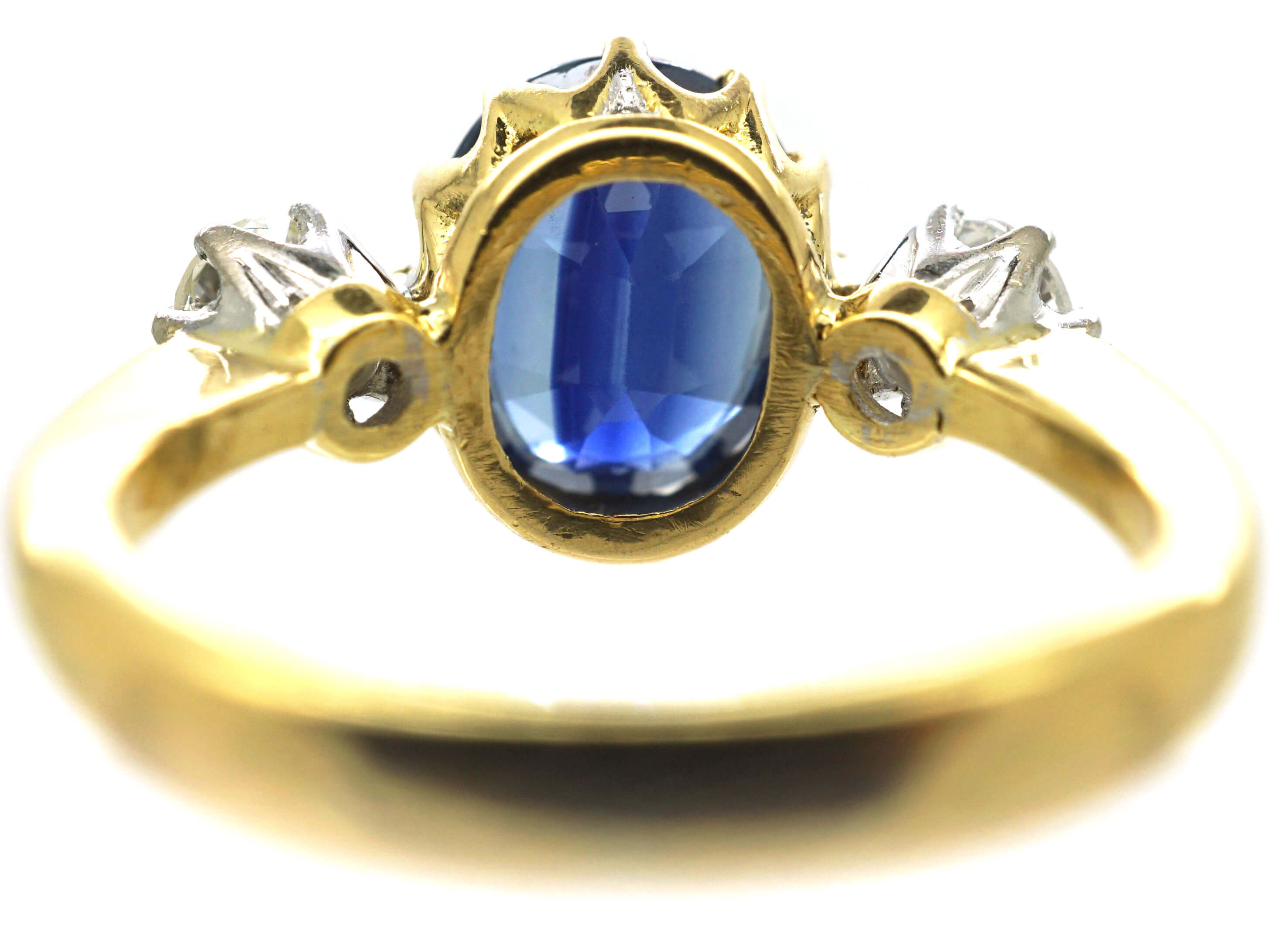 A pretty Sapphire and Diamond three stone ring