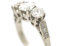 Platinum Three Stone Diamond Ring with Diamond Set Shoulders