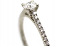 Platinum & Diamond Solitaire Ring with Diamond Set Shoulders by De Beers