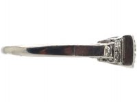 Art Deco Platinum, Diamond Solitaire Ring with Step Cut Shoulders set with Diamonds