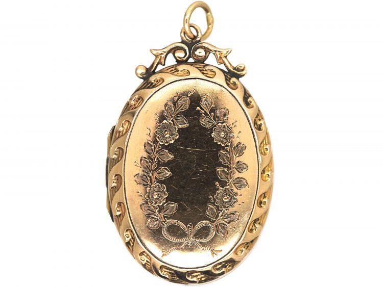 Edwardian Oval Shaped 9ct Gold Engraved Locket with Bow Top