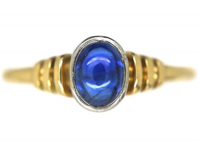 18ct Gold Sapphire Cabochon Single Stone Ring With Vertical Grooved Shoulders