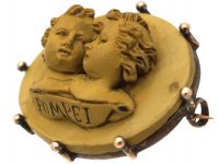 Grand Tour Brooch of Two Children Carved in Lava Stone