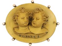 Grand Tour Brooch of Two Children Carved in Lava Stone