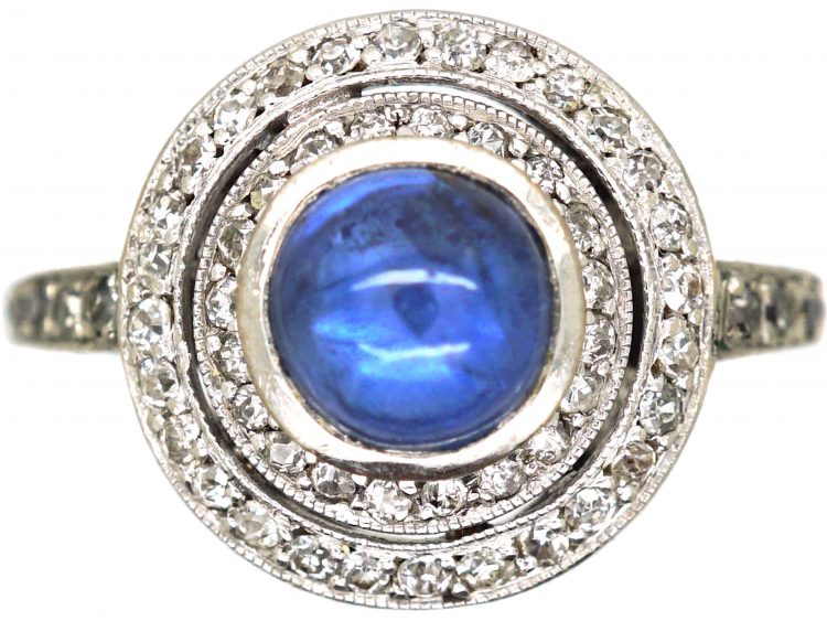 Art Deco Platinum, Cabochon Sapphire & Two Circle Diamond Ring