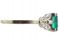 Art Deco Platinum, Rectangular Cut Emerald Ring with Diamond Set Shoulders
