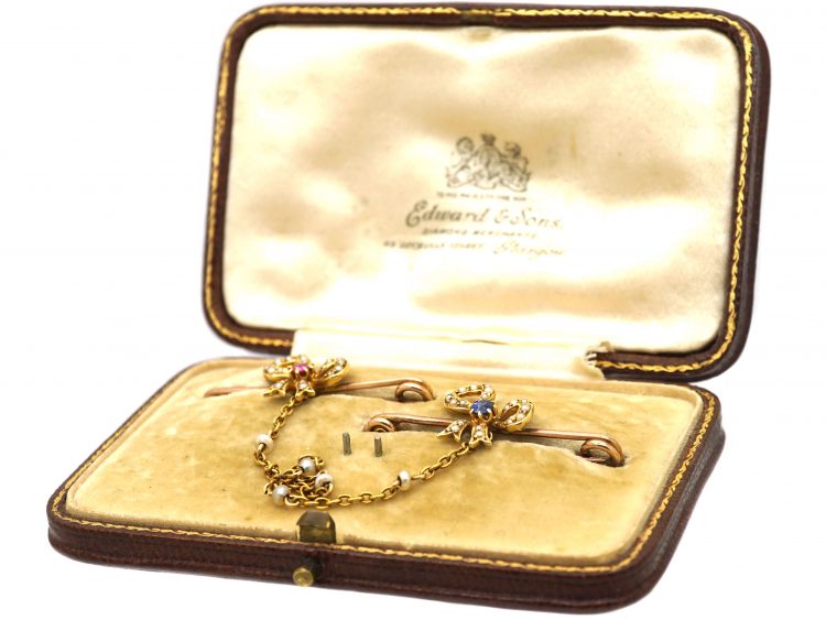 Edwardian Pair of 15ct Gold Bow Brooches set with a Sapphire & a Ruby & Natural Split Pearls in Original Case
