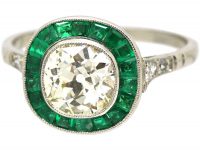Platinum, Large Single Diamond Solitaire Ring with Calibre Emerald Frame