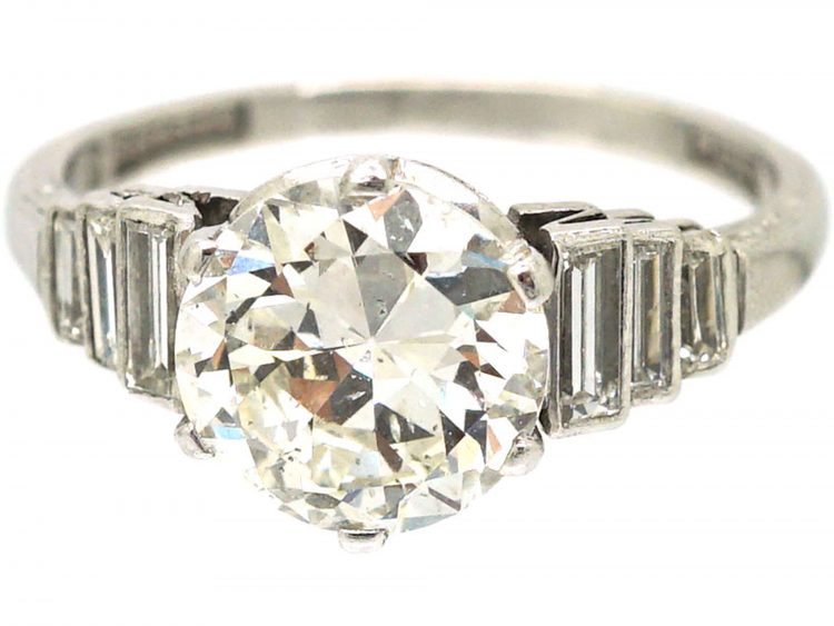 Art Deco Platinum, Old European Cut Diamond Solitaire Ring with Step Cut Shoulders set with Baguette Diamonds