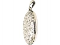 Victorian Silver Oval Locket with Engraved Ivy Leaf Detail