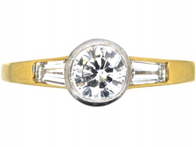 18ct Gold Diamond Solitaire Ring with Tapered Baguette Shoulders