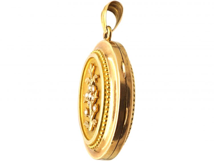 French 18ct Gold Oval Shaped Locket with a Flower Motif set with Natural Split Pearls