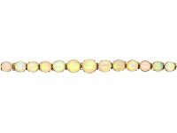 Retro 9ct Gold Bracelet set with a Line of Graduated Opals
