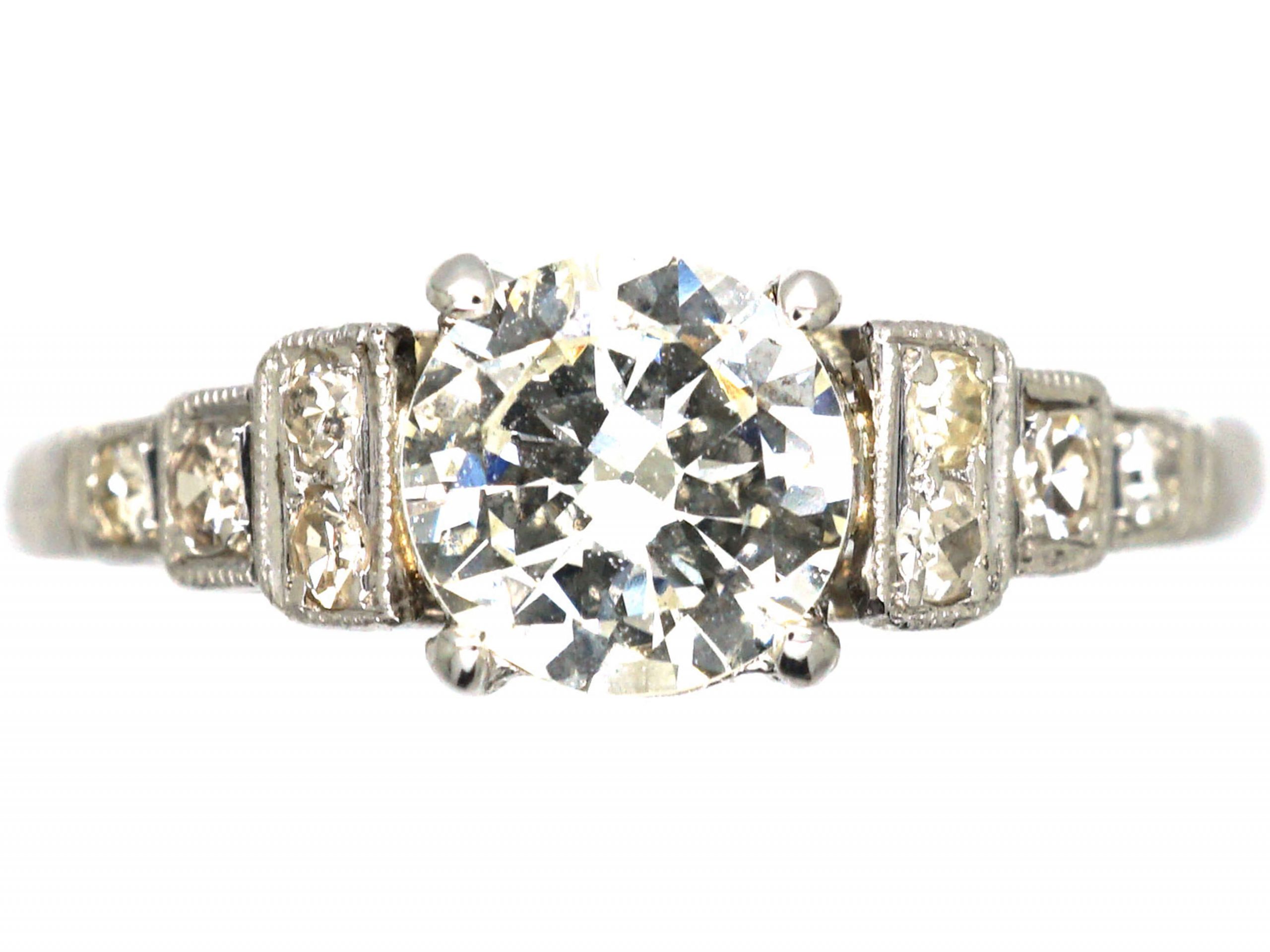Art Deco Platinum Solitaire Diamond Ring with Step Cut Shoulders set ...