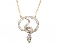 Edwardian Snake Pendant set with Diamonds with Green Garnet Eyes on a Gold Chain
