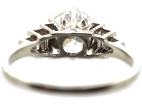Art Deco Platinum Diamond Solitaire Ring with Step Cut Baguette Diamond Shoulders