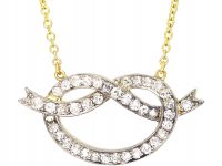 Edwardian Lover's Knot Pendant on Chain Set With Diamonds
