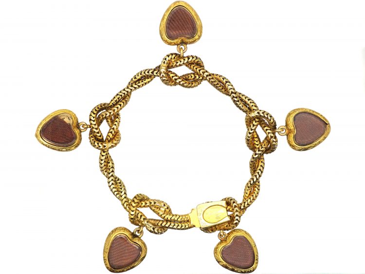 Early Victorian 18ct Gold Lover's Knot Bracelet with Five Hearts set with Cabochon Garnets