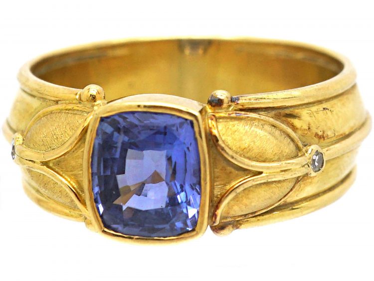 18ct Gold & Sapphire Ring with Raised Gold Motifs & Small Diamonds