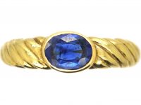 18ct Gold Modernist Coil Design Ring set with a Sapphire