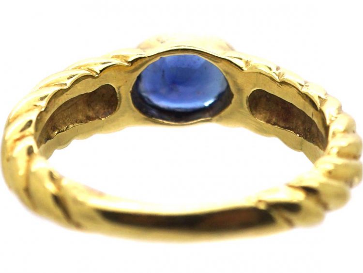 18ct Gold Modernist Coil Design Ring set with a Sapphire