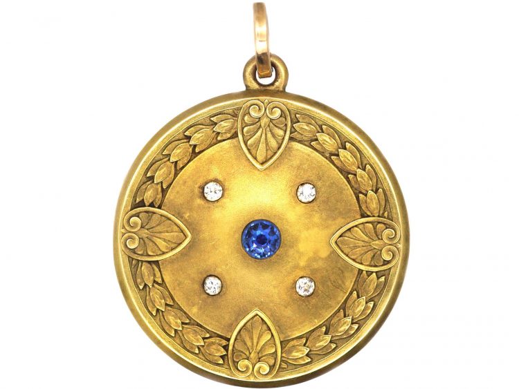 Early 20th Century Round Locket set with a Sapphire & Diamonds