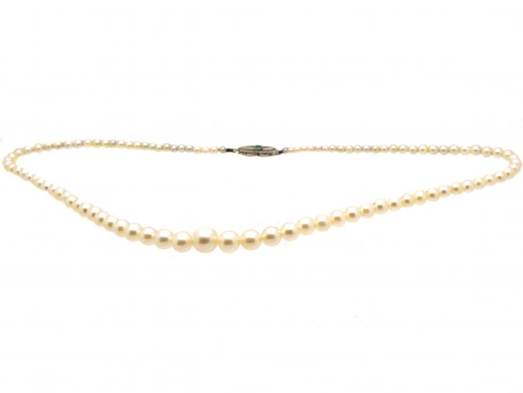 Edwardian Graduated Cultured Pearl Necklace with an 18ct White Gold, Emerald & Diamond Clasp