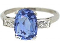 Art Deco Platinum and Sapphire Solitaire Ring with French Cut Diamond Shoulders