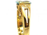 18ct Gold Ring set with a Rectangular Cut Aquamarine with Diamonds on Either Side