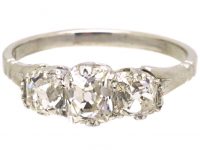 Early 20th Century Platinum, Old Mine Cut Three Stone Diamond Ring